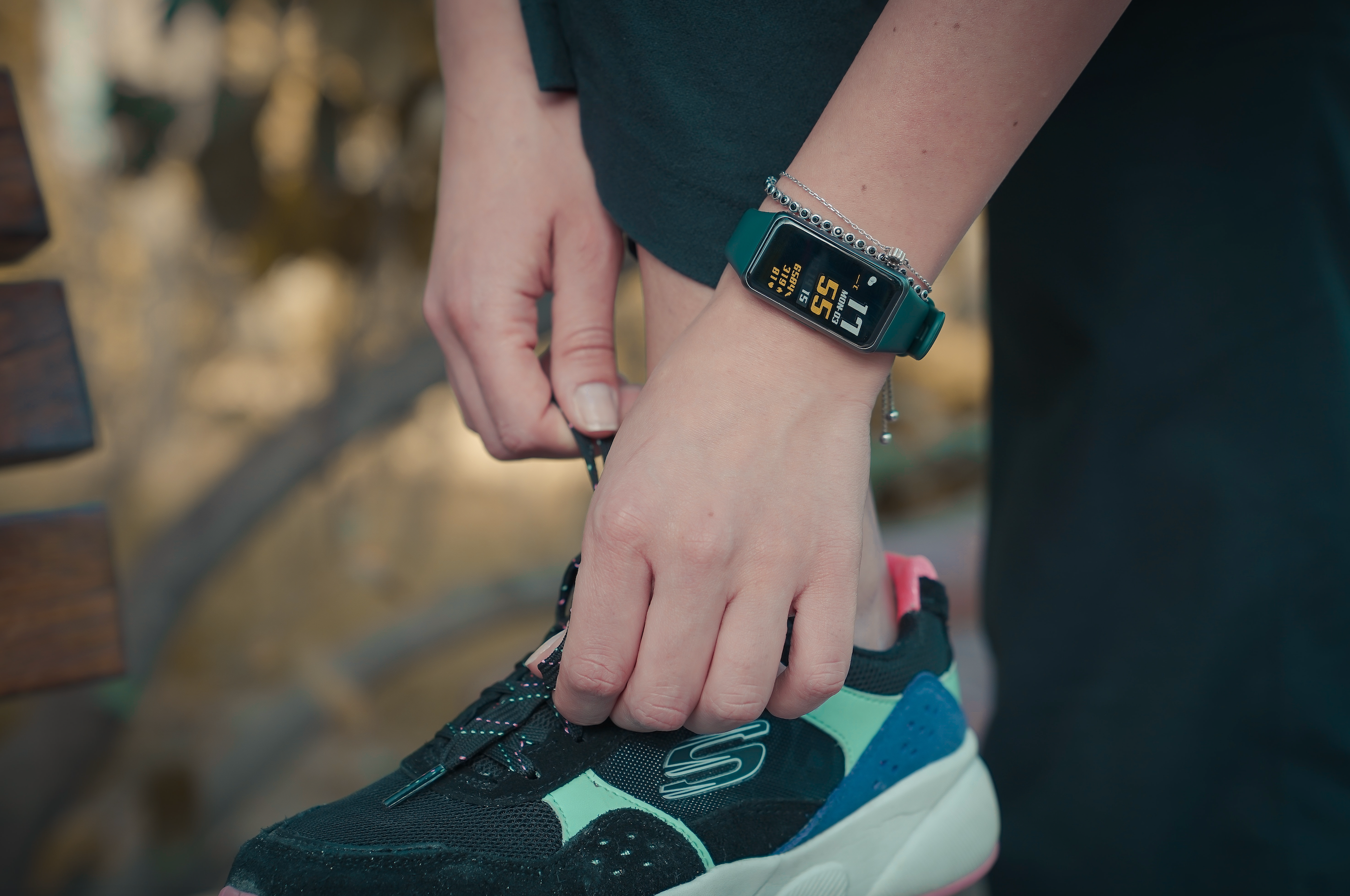 person tying shoelaces getting ready for run